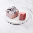 Load image into Gallery viewer, Deluxe Ring Packaging with Bow Boxes on a white marble coaster
