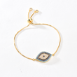 Load image into Gallery viewer, Gold Chain Wide Blue Evil Eye Bracelet on a white background
