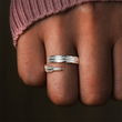 Load image into Gallery viewer, Personalized Adjustable Plume Ring worn by a model on his ring finger
