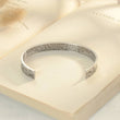 Load image into Gallery viewer, To My Daughter, Love You Forever Bracelet on a page of an open book
