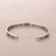 Load image into Gallery viewer, You Are The Sister I Got To Choose printed on a silver cuff bracelet placed on top of a brown fabric
