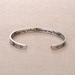 Load image into Gallery viewer, &quot;Always my sister, forever my friend&quot; engraved on a silver bracelet placed on top of a brown fabric

