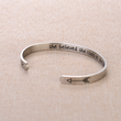 Load image into Gallery viewer, Inspirational message engraved on a silver-plated cuff bracelet in a different angle
