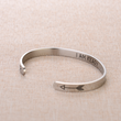 Load image into Gallery viewer, &quot;I am ready&quot; motivational silver bracelet placed on top of brown fabric
