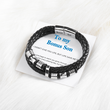Load image into Gallery viewer, To My Bonus Son Leather Bracelet on top of a heartfelt note
