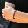 Load image into Gallery viewer, A close-up shot of a model wearing To My Son, I Love You Leather Morse Code Bracelet
