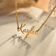 Load image into Gallery viewer, Close-up shot of Custom Fairy Name Necklace on a page of an open book
