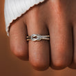 Load image into Gallery viewer, To My Wife Love Knot Ring worn on the ring finger worn by a finger by a model with a closed fist
