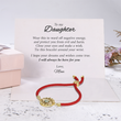 Load image into Gallery viewer, Evil eye red string protection bracelet placed on top Svana Design message card
