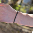Load image into Gallery viewer, model wearing Morse Code Bracelet

