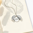 Load image into Gallery viewer, To My Daughter, You Are My Sunshine Personalized Necklace displayed on the top of a book
